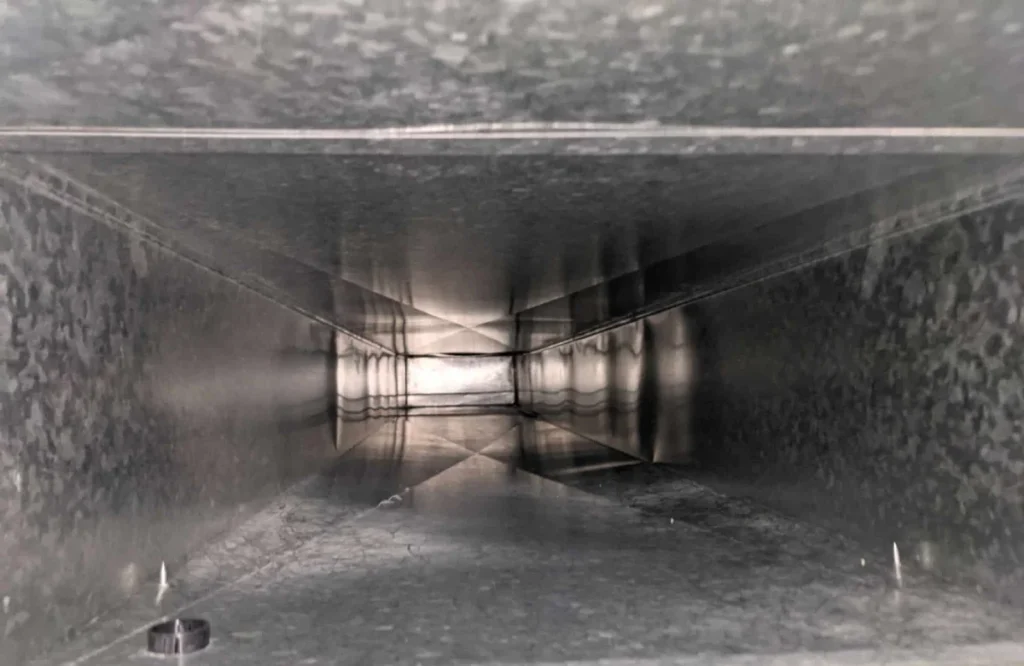 Clean shiny air duct after professional cleaning no dust